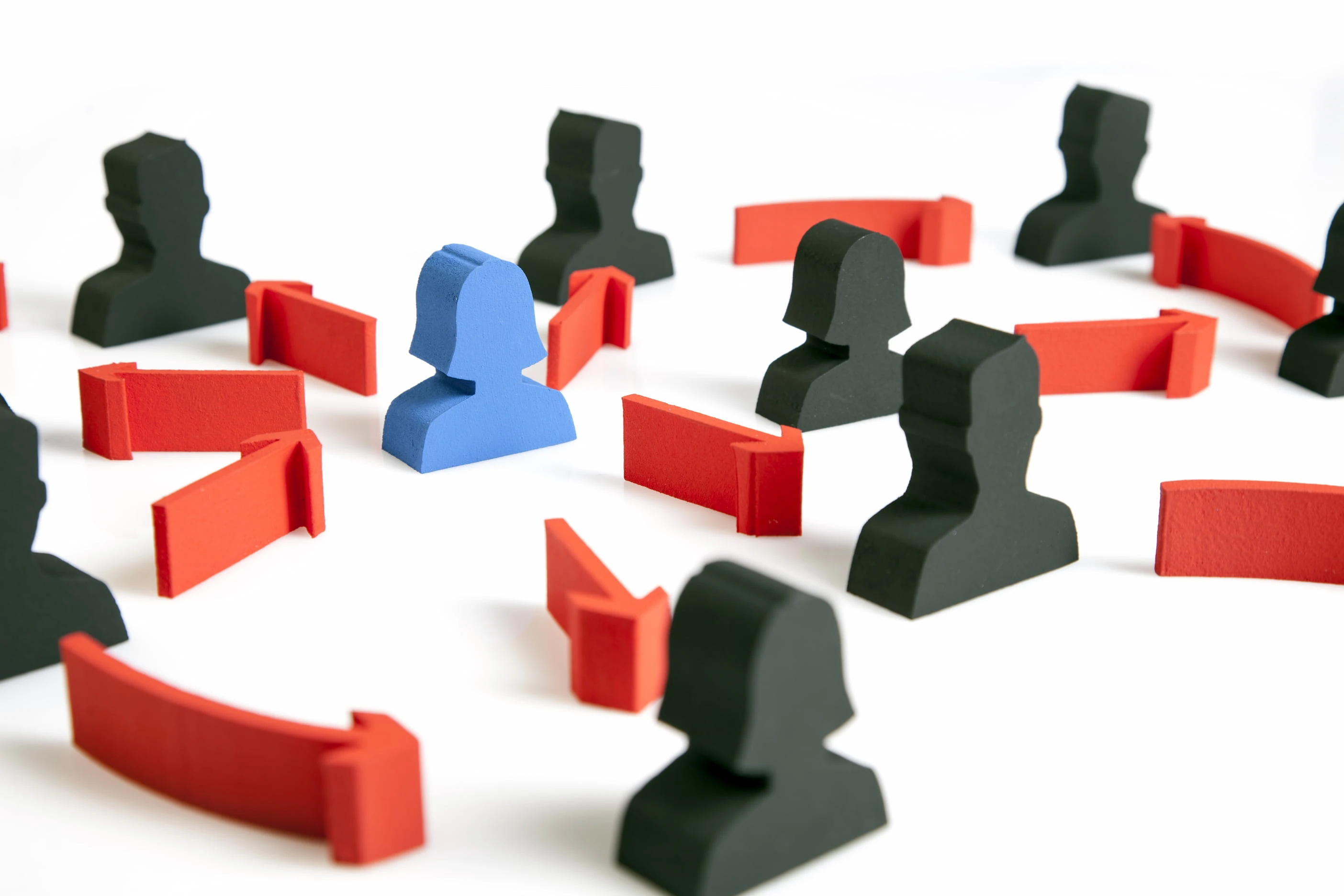 A single highlighted figure standing out among rows of identical figures separated by connectors